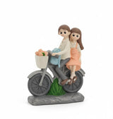 AKDC Polyresin Romantic Couple Riding Bicycle Figurine – Orange & Gray Love Décor 12 cm - Al Kabayel Discount CentreAKDC Polyresin Romantic Couple Riding Bicycle Figurine – Orange & Gray Love Décor 12 cmHome Décor AccentsAKDCAl Kabayel Discount Centre