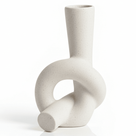 AKDC Premium Artistic Ceramic Home Décor Vase – Elegant White Unique Shape Statement Piece, 17 × 10 cm - Al Kabayel Discount CentreAKDC Premium Artistic Ceramic Home Décor Vase – Elegant White Unique Shape Statement Piece, 17 × 10 cmFlower/Plant PotsAKDCAl Kabayel Discount Centre