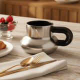 AKDC Premium Ceramic Coffee Mug 400 ml – Elegant Silver and Black Finish with Coffee Time Text, Large Capacity Mug for Tea, Coffee and Hot Beverages - Al Kabayel Discount CentreAKDC Premium Ceramic Coffee Mug 400 ml – Elegant Silver and Black Finish with Coffee Time Text, Large Capacity Mug for Tea, Coffee and Hot BeveragesMugsAKDCAl Kabayel Discount Centre