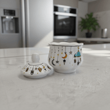 AKDC Ramadan Collection White Ceramic Sugar Pot with Lid – Elegant Festive Tableware, 11 × 9cm - Al Kabayel Discount CentreAKDC Ramadan Collection White Ceramic Sugar Pot with Lid – Elegant Festive Tableware, 11 × 9cmBowlsAKDCAl Kabayel Discount Centre
