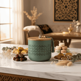 AKDC Sage Green Metal Candy Storage Jar with Wooden Lid – Elegant Kitchen Storage for Sweets & Snacks – 18 × 17 cm - Al Kabayel Discount CentreAKDC Sage Green Metal Candy Storage Jar with Wooden Lid – Elegant Kitchen Storage for Sweets & Snacks – 18 × 17 cmJars & Food SaversAKDCAl Kabayel Discount Centre