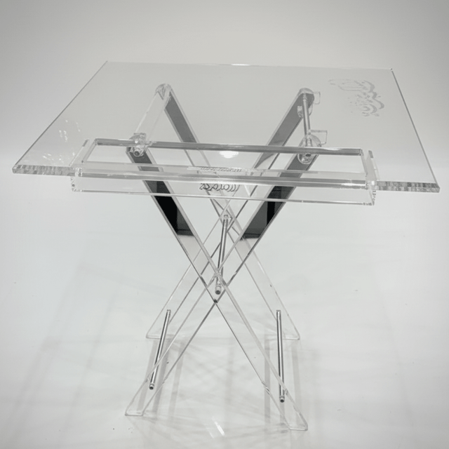AKDC Square Clear Acrylic Foldable Table Set with Silver Metal Supports and Subtle Arabic Calligraphy Pattern Contemporary Design 50x40x47 cm - Al Kabayel Discount CentreAKDC Square Clear Acrylic Foldable Table Set with Silver Metal Supports and Subtle Arabic Calligraphy Pattern Contemporary Design 50x40x47 cmOrganizers & AccessoriesAKDCAl Kabayel Discount Centre