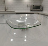 AKDC Square Glass Serving Tray – 18×5 cm Elegant Clear Design, Ideal for Modern Table Presentation - Al Kabayel Discount CentreAKDC Square Glass Serving Tray – 18×5 cm Elegant Clear Design, Ideal for Modern Table PresentationServing TraysAKDCAl Kabayel Discount Centre