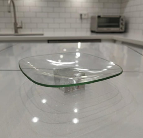 AKDC Square Glass Serving Tray – 18×5 cm Elegant Clear Design, Ideal for Modern Table Presentation - Al Kabayel Discount CentreAKDC Square Glass Serving Tray – 18×5 cm Elegant Clear Design, Ideal for Modern Table PresentationServing TraysAKDCAl Kabayel Discount Centre