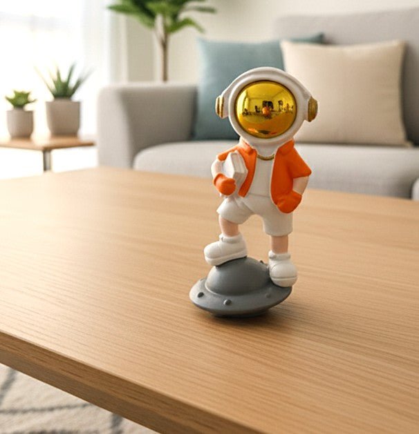 AKDC Stylish Ceramic Astronaut Standing on White & Orange Spaceship Figurine – Contemporary Space Décor 14 cm - Al Kabayel Discount CentreAKDC Stylish Ceramic Astronaut Standing on White & Orange Spaceship Figurine – Contemporary Space Décor 14 cmHome Décor AccentsAKDCAl Kabayel Discount Centre