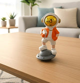 AKDC Stylish Ceramic Astronaut Standing on White & Orange Spaceship Figurine – Contemporary Space Décor 14 cm - Al Kabayel Discount CentreAKDC Stylish Ceramic Astronaut Standing on White & Orange Spaceship Figurine – Contemporary Space Décor 14 cmHome Décor AccentsAKDCAl Kabayel Discount Centre