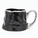 AKDC Stylish Ceramic Coffee Mug 400 ml – Elegant Silver and Black Decorative Pattern Design Mug for Modern Drinkware Collection - Al Kabayel Discount CentreAKDC Stylish Ceramic Coffee Mug 400 ml – Elegant Silver and Black Decorative Pattern Design Mug for Modern Drinkware CollectionMugsAKDCAl Kabayel Discount Centre