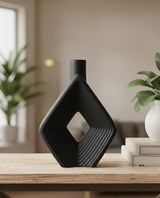 AKDC Tall Black Ceramic Display Vase – 17×25 cm - Al Kabayel Discount CentreAKDC Tall Black Ceramic Display Vase – 17×25 cmFlower/Plant PotsAKDCAl Kabayel Discount Centre