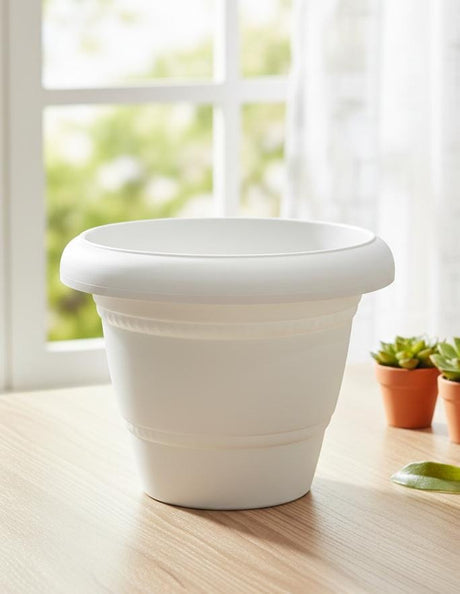 AKDC White Round Plastic Plant Pot – Minimalist Indoor/Outdoor Planter – 17 cm - Al Kabayel Discount CentreAKDC White Round Plastic Plant Pot – Minimalist Indoor/Outdoor Planter – 17 cmFlower/Plant PotsAKDCAl Kabayel Discount Centre