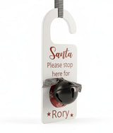 AKDC White “Santa Please Stop Here for Rory” Hanging Décor with Bell – Elegant Christmas Wall Decoration Sign - Al Kabayel Discount CentreAKDC White “Santa Please Stop Here for Rory” Hanging Décor with Bell – Elegant Christmas Wall Decoration SignHome Décor AccentsAKDCAl Kabayel Discount Centre
