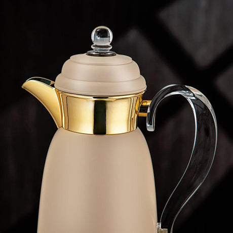 Almarjan 2pcs Vaccum Flask 0.7L+1L, Keeps Tea & Coffee Hot & Cold for 8hrs, Beige - Gold - Al Kabayel Discount CentreAlmarjan 2pcs Vaccum Flask 0.7L+1L, Keeps Tea & Coffee Hot & Cold for 8hrs, Beige - GoldThermosALMARJANAl Kabayel Discount Centre