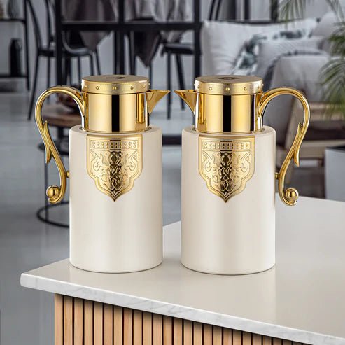 Almarjan 2pcs Vaccum Flask 1L+1L, Keeps Tea & Coffee Hot & Cold for 8hr, Ivory/Gold - Al Kabayel Discount CentreAlmarjan 2pcs Vaccum Flask 1L+1L, Keeps Tea & Coffee Hot & Cold for 8hr, Ivory/GoldThermosALMARJANAl Kabayel Discount Centre