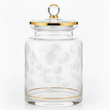 Almarjan Cylindrical Glass Candy Pot | Gold - Rimmed Botanical Elegance | 17×10cm - Al Kabayel Discount CentreAlmarjan Cylindrical Glass Candy Pot | Gold - Rimmed Botanical Elegance | 17×10cmJars & Food SaversALMARJANAl Kabayel Discount Centre