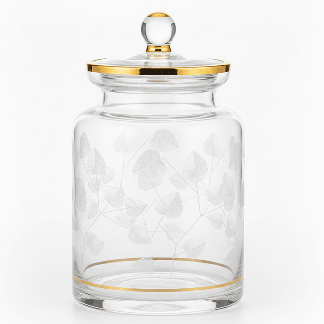 Almarjan Cylindrical Glass Candy Pot | Gold - Rimmed Botanical Elegance | 17×10cm - Al Kabayel Discount CentreAlmarjan Cylindrical Glass Candy Pot | Gold - Rimmed Botanical Elegance | 17×10cmJars & Food SaversALMARJANAl Kabayel Discount Centre