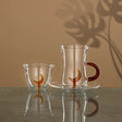 ALMARJAN Moonrise Collection 18pcs Tea & Coffee Set(6pcs Cawa Cup 80ml, 6pcs Cup 150ml, 6pcs Saucer), Borosilicate Glass, Clear & Amber - Al Kabayel Discount CentreALMARJAN Moonrise Collection 18pcs Tea & Coffee Set(6pcs Cawa Cup 80ml, 6pcs Cup 150ml, 6pcs Saucer), Borosilicate Glass, Clear & AmberTea SetsALMARJANAl Kabayel Discount Centre