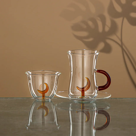 ALMARJAN Moonrise Collection 18pcs Tea & Coffee Set(6pcs Cawa Cup 80ml, 6pcs Cup 150ml, 6pcs Saucer), Borosilicate Glass, Clear & Amber - Al Kabayel Discount CentreALMARJAN Moonrise Collection 18pcs Tea & Coffee Set(6pcs Cawa Cup 80ml, 6pcs Cup 150ml, 6pcs Saucer), Borosilicate Glass, Clear & AmberTea SetsALMARJANAl Kabayel Discount Centre