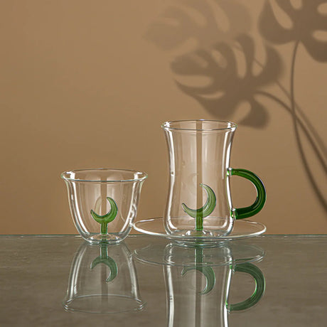 ALMARJAN Moonrise Collection 18pcs Tea & Coffee Set(6pcs Cawa Cup 80ml, 6pcs Cup 150ml, 6pcs Saucer), Borosilicate Glass, Clear & Green - Al Kabayel Discount CentreALMARJAN Moonrise Collection 18pcs Tea & Coffee Set(6pcs Cawa Cup 80ml, 6pcs Cup 150ml, 6pcs Saucer), Borosilicate Glass, Clear & GreenTea SetsALMARJANAl Kabayel Discount Centre