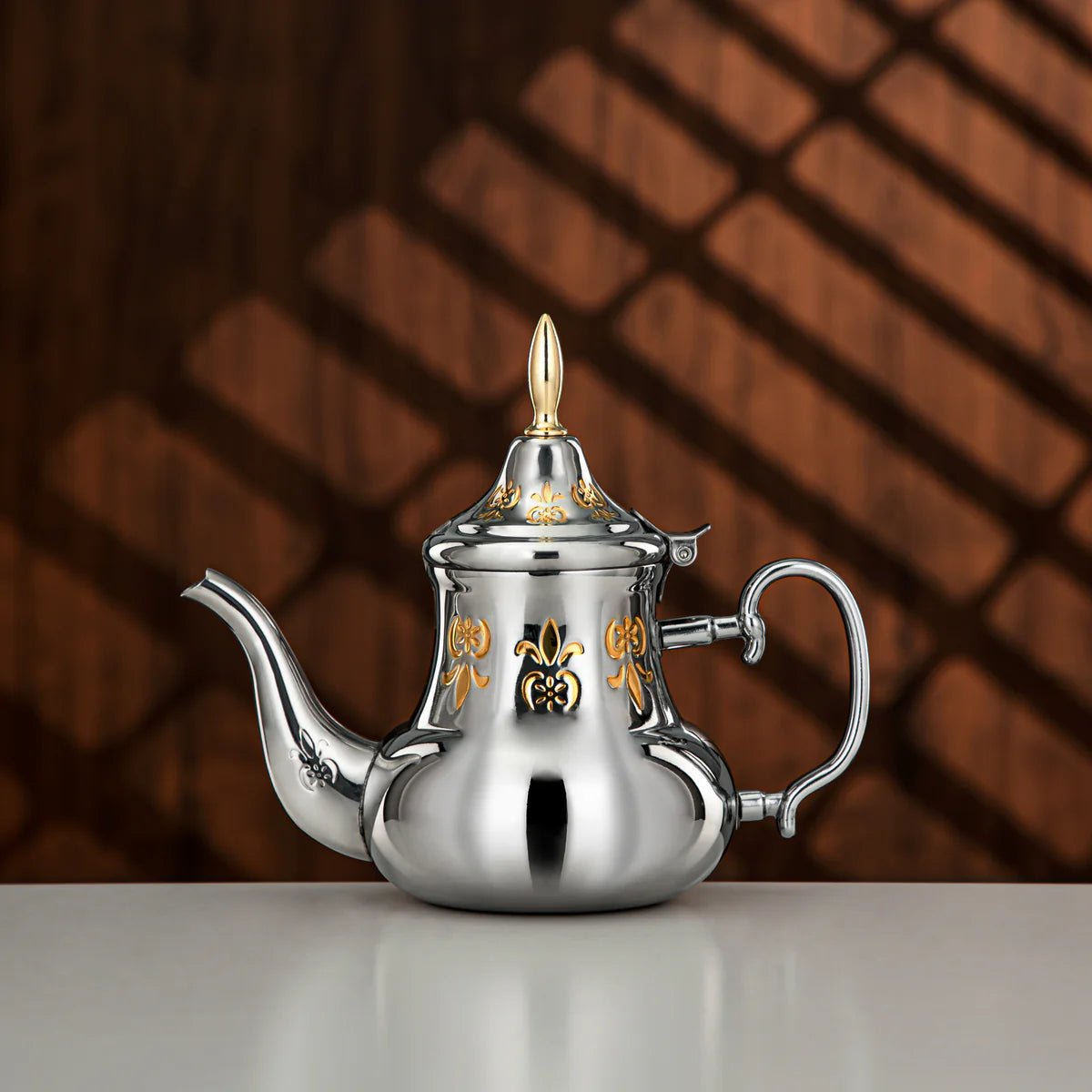 ALMARJAN Stainless SteelTeapot 0.8 Liter, Silver/Gold - Al Kabayel Discount CentreALMARJAN Stainless SteelTeapot 0.8 Liter, Silver/GoldTea/Coffee PotsALMARJANAl Kabayel Discount Centre