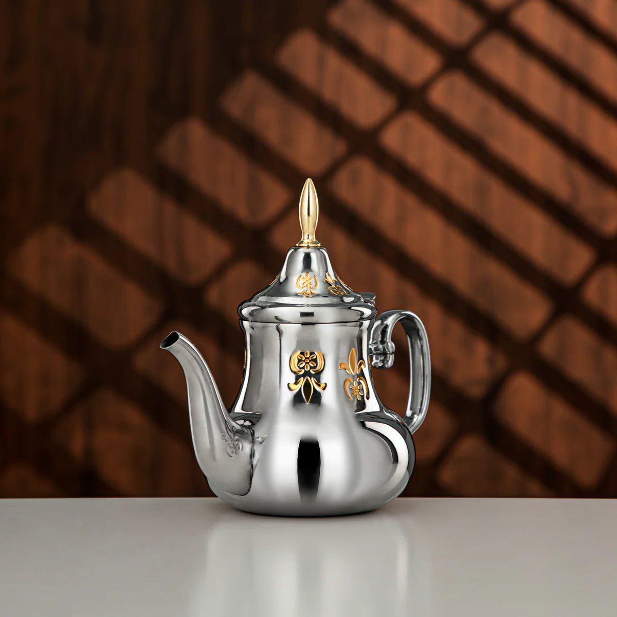 ALMARJAN Stainless SteelTeapot 0.8 Liter, Silver/Gold - Al Kabayel Discount CentreALMARJAN Stainless SteelTeapot 0.8 Liter, Silver/GoldTea/Coffee PotsALMARJANAl Kabayel Discount Centre
