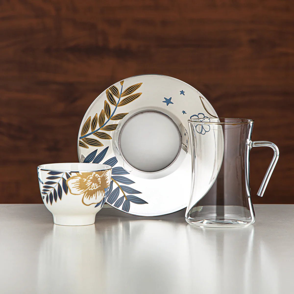 Almarjan Tea Set Borosilicate Glass, Stainless Steel & Porcelain 18 Pieces (18PCS - 12196 - 1) â€“ Blue Botanical Tea Collection - Al Kabayel Discount CentreAlmarjan Tea Set Borosilicate Glass, Stainless Steel & Porcelain 18 Pieces (18PCS - 12196 - 1) â€“ Blue Botanical Tea CollectionTea SetsALMARJANAl Kabayel Discount Centre