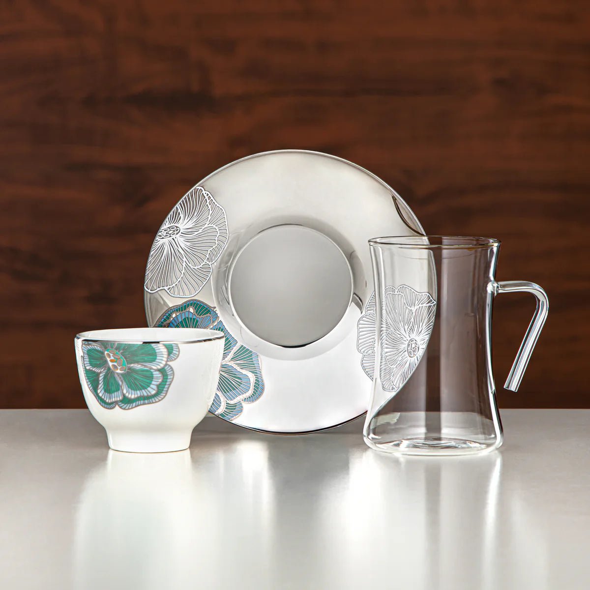 Almarjan Tea Set Borosilicate Glass, Stainless Steel & Porcelain 18 Pieces (18PCS - 12257 - 1) â€“ Emerald Bloom Tea Collection - Al Kabayel Discount CentreAlmarjan Tea Set Borosilicate Glass, Stainless Steel & Porcelain 18 Pieces (18PCS - 12257 - 1) â€“ Emerald Bloom Tea CollectionTea SetsALMARJANAl Kabayel Discount Centre