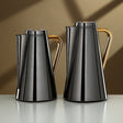 Almarjan Vacuum Flask Set 0.7L + 1L Gun Black & Gold - Al Kabayel Discount CentreAlmarjan Vacuum Flask Set 0.7L + 1L Gun Black & GoldThermosALMARJANAl Kabayel Discount Centre