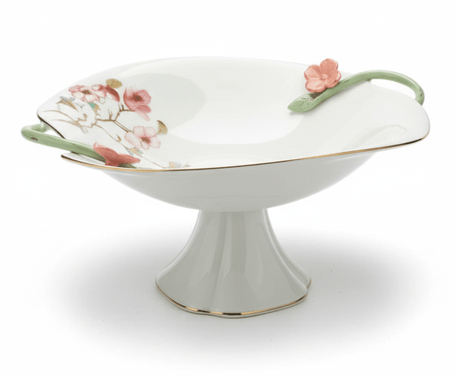 Angela Floral Grand Footed Ceramic Fruit Serving Bowl – White (29×18 cm) - Al Kabayel Discount CentreAngela Floral Grand Footed Ceramic Fruit Serving Bowl – White (29×18 cm)Serving TraysANGELAAl Kabayel Discount Centre