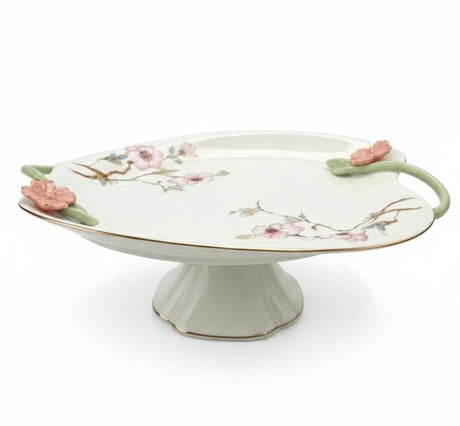 Angela Floral Premium Footed Ceramic Fruit Serving Plate – White (29×12 cm) - Al Kabayel Discount CentreAngela Floral Premium Footed Ceramic Fruit Serving Plate – White (29×12 cm)Serving TraysANGELAAl Kabayel Discount Centre