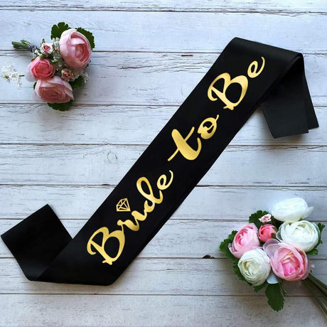 Bride - to - Be Celebration Sash 160×10 cm – Black with Sparkling Gold Text - Al Kabayel Discount CentreBride - to - Be Celebration Sash 160×10 cm – Black with Sparkling Gold TextParty SuppliesPARTY SASHAl Kabayel Discount Centre