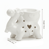 Camel Shape Ceramic Oil Burner 10×8 cm - White / Sage Green - Al Kabayel Discount CentreCamel Shape Ceramic Oil Burner 10×8 cm - White / Sage GreenHome Décor AccentsAKDCAl Kabayel Discount Centre
