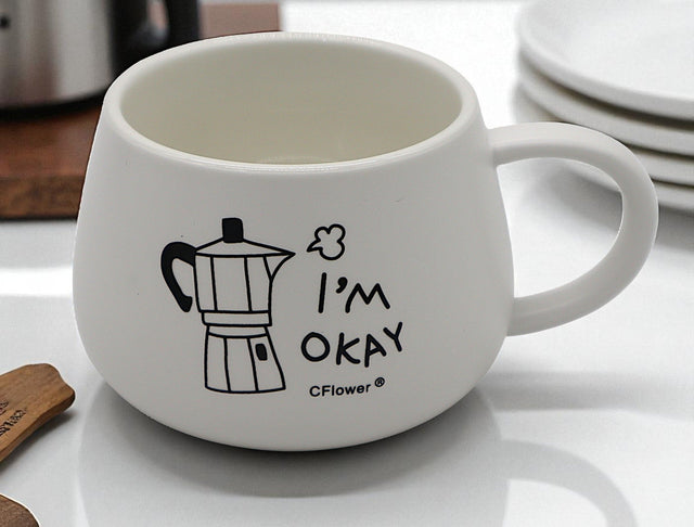 CFLOWER Porcelain Mug 400ml – White Cup with “I’m Okay” Text Design, Simple & Inspiring Mug for Coffee and Tea Lovers - Al Kabayel Discount CentreCFLOWER Porcelain Mug 400ml – White Cup with “I’m Okay” Text Design, Simple & Inspiring Mug for Coffee and Tea LoversMugsCFLOWERAl Kabayel Discount Centre