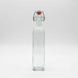 Clear Glass Oil Bottle with Swing Top Stopper – 300ml - Al Kabayel Discount CentreClear Glass Oil Bottle with Swing Top Stopper – 300mlOil DispensersAKDCAl Kabayel Discount Centre