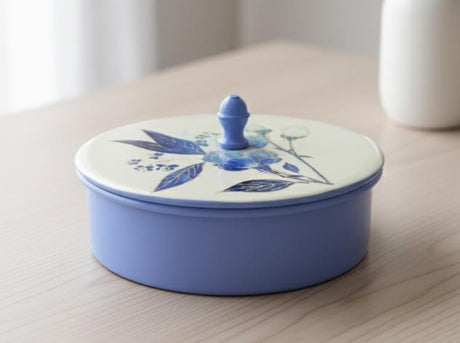 DALLAH ADDAR ROUND CANDY STORAGE BOX – 15CM PREMIUM BLUE COLOR METAL CONTAINER FOR SWEETS, SNACKS, CHOCOLATES & HOME DECOR USE - Al Kabayel Discount CentreDALLAH ADDAR ROUND CANDY STORAGE BOX – 15CM PREMIUM BLUE COLOR METAL CONTAINER FOR SWEETS, SNACKS, CHOCOLATES & HOME DECOR USEJars & Food SaversDALLAH ADDARAl Kabayel Discount Centre