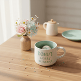Donut Worry Be Happy | White & Mint Green Ceramic Mug with Hidden Donut Surprise | 400ml - Al Kabayel Discount CentreDonut Worry Be Happy | White & Mint Green Ceramic Mug with Hidden Donut Surprise | 400mlMugsAKDCAl Kabayel Discount Centre
