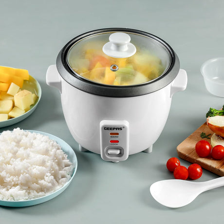 Geepas GRC1828H 0.6L Rice Cooker with Non - Stick Cooking Pot | 350W | Automatic Cooking, Steam Vent Lid & Simple One Touch Operation |Make Rice, Steam Healthy Food & Vegetables - Al Kabayel Discount CentreGeepas GRC1828H 0.6L Rice Cooker with Non - Stick Cooking Pot | 350W | Automatic Cooking, Steam Vent Lid & Simple One Touch Operation |Make Rice, Steam Healthy Food & VegetablesRice CookersGEEPASAl Kabayel Discount Centre