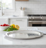 Germax Oval Steel Serving Tray – Unique Silver Finish | 24×16 cm Classic Tableware - Al Kabayel Discount CentreGermax Oval Steel Serving Tray – Unique Silver Finish | 24×16 cm Classic TablewareServing TraysGERMAXAl Kabayel Discount Centre