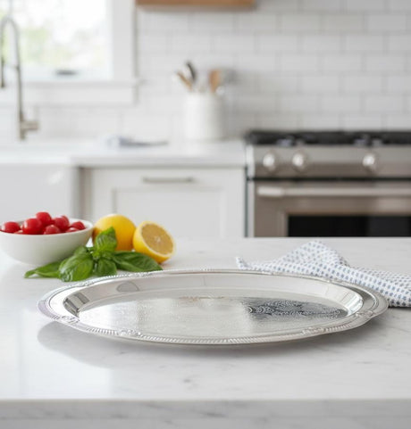 Germax Oval Steel Serving Tray – Unique Silver Finish | 24×16 cm Classic Tableware - Al Kabayel Discount CentreGermax Oval Steel Serving Tray – Unique Silver Finish | 24×16 cm Classic TablewareServing TraysGERMAXAl Kabayel Discount Centre