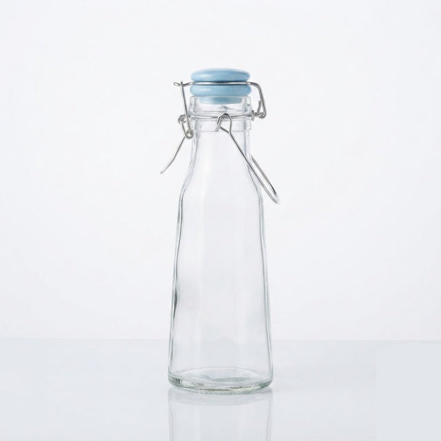 Glass Bottle With Swing-Top Clip Closure - 500ml - Light Blue / Light Green / Black - Al Kabayel Discount CentreGlass Bottle With Swing-Top Clip Closure - 500ml - Light Blue / Light Green / BlackWater BottlesAKDCAl Kabayel Discount Centre