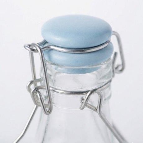 Glass Bottle With Swing-Top Clip Closure - 500ml - Light Blue / Light Green / Black - Al Kabayel Discount CentreGlass Bottle With Swing-Top Clip Closure - 500ml - Light Blue / Light Green / BlackWater BottlesAKDCAl Kabayel Discount Centre
