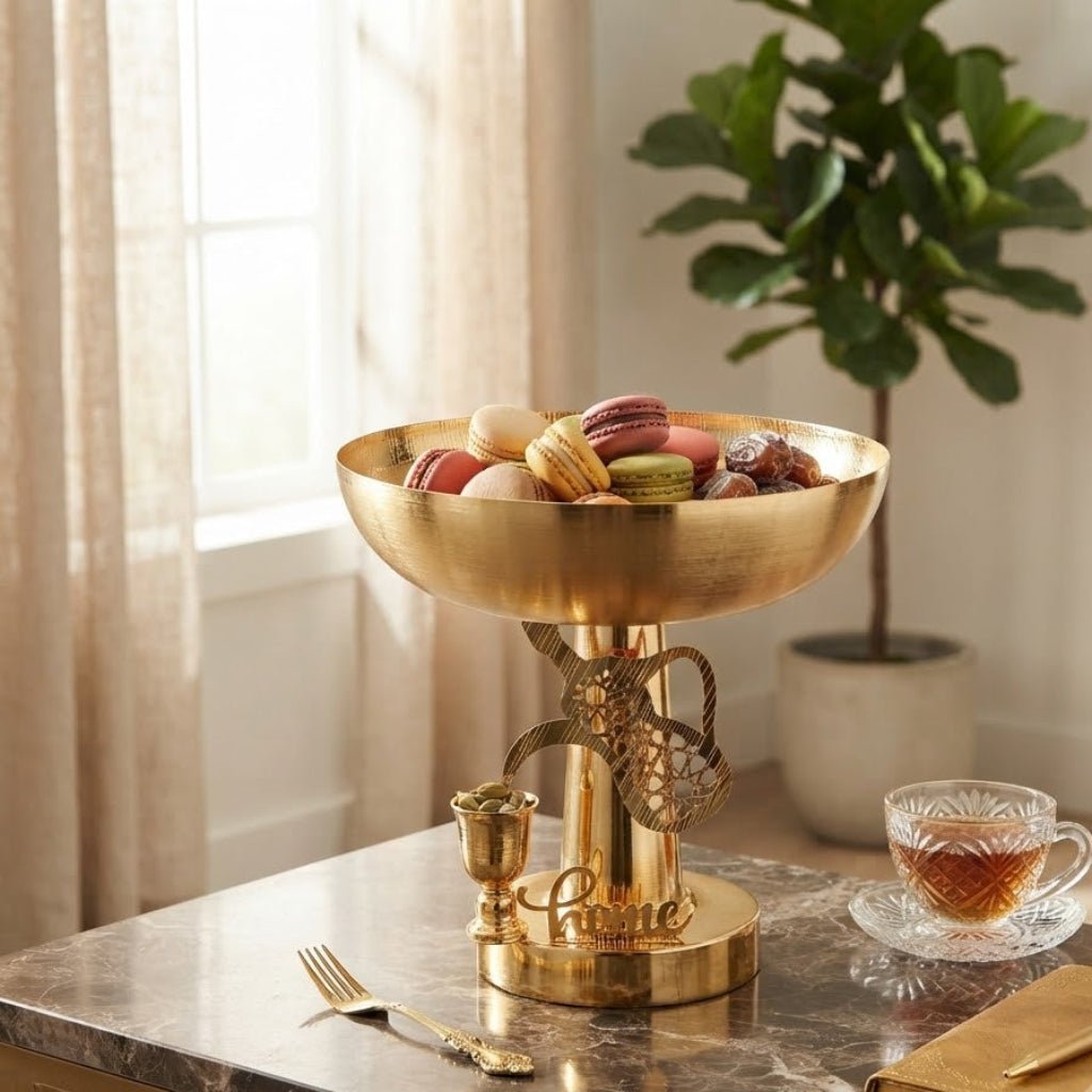 Gold Metal Footed Serving Bowl With Arabic Dallah & Oud Design – 28×32 cm - Al Kabayel Discount CentreGold Metal Footed Serving Bowl With Arabic Dallah & Oud Design – 28×32 cmBowlsAKDCAl Kabayel Discount Centre