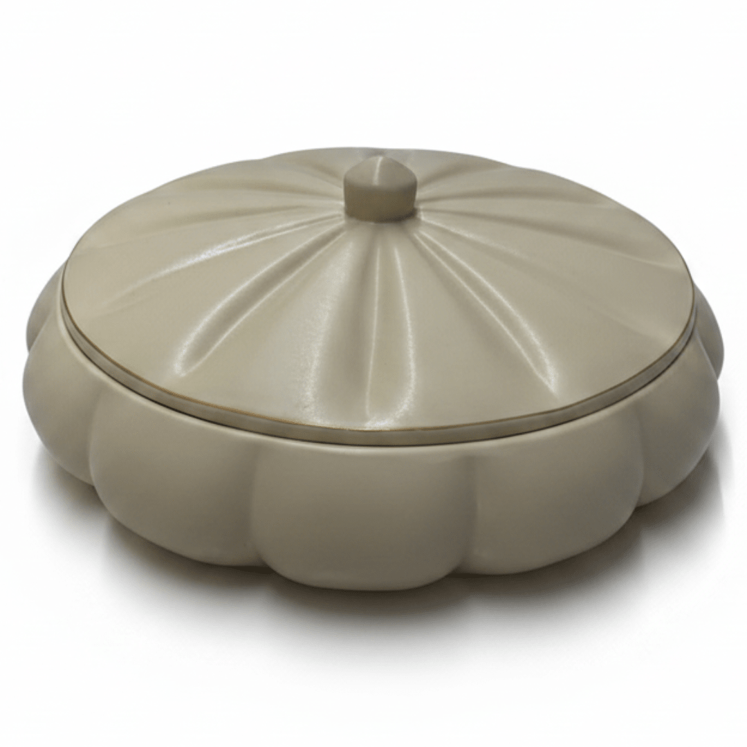 Hamid Cream Ceramic Candy Box with Lid | Scalloped Pumpkin Design | 10.25cm - Al Kabayel Discount CentreHamid Cream Ceramic Candy Box with Lid | Scalloped Pumpkin Design | 10.25cmJars & Food SaversHAMIDAl Kabayel Discount Centre