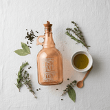 Herevin Tinted Orange Glass Oil Bottle – 1 Litre | Elegant Etched Design with Handle - Al Kabayel Discount CentreHerevin Tinted Orange Glass Oil Bottle – 1 Litre | Elegant Etched Design with HandleKitchen Utensils & GadgetsHEREVINAl Kabayel Discount Centre