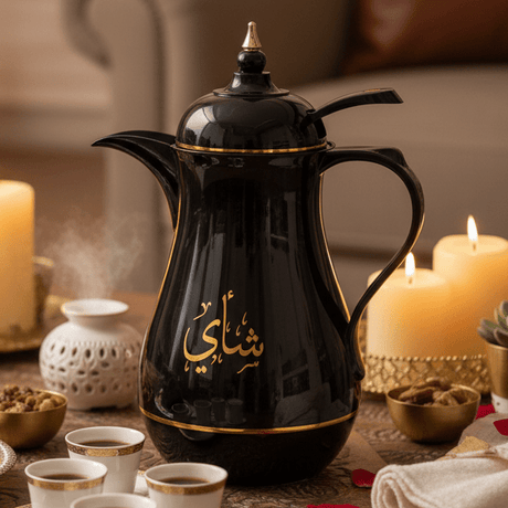 Kitchenmark 1 Liter Thermal Vacuum Flask – Black with Gold 'Tea' Lettering – Stylish Coffee & Tea Server - Al Kabayel Discount CentreKitchenmark 1 Liter Thermal Vacuum Flask – Black with Gold 'Tea' Lettering – Stylish Coffee & Tea ServerThermosKITCHENMARKAl Kabayel Discount Centre