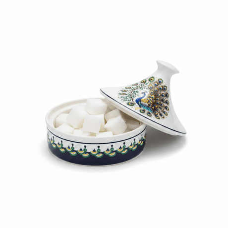 Luhpar Decorative Ceramic Sugar Pot with Peacock Artwork and Lid for Stylish Food Presentation – 15×15 cm - Al Kabayel Discount CentreLuhpar Decorative Ceramic Sugar Pot with Peacock Artwork and Lid for Stylish Food Presentation – 15×15 cmJars & Food SaversLUHPARAl Kabayel Discount Centre