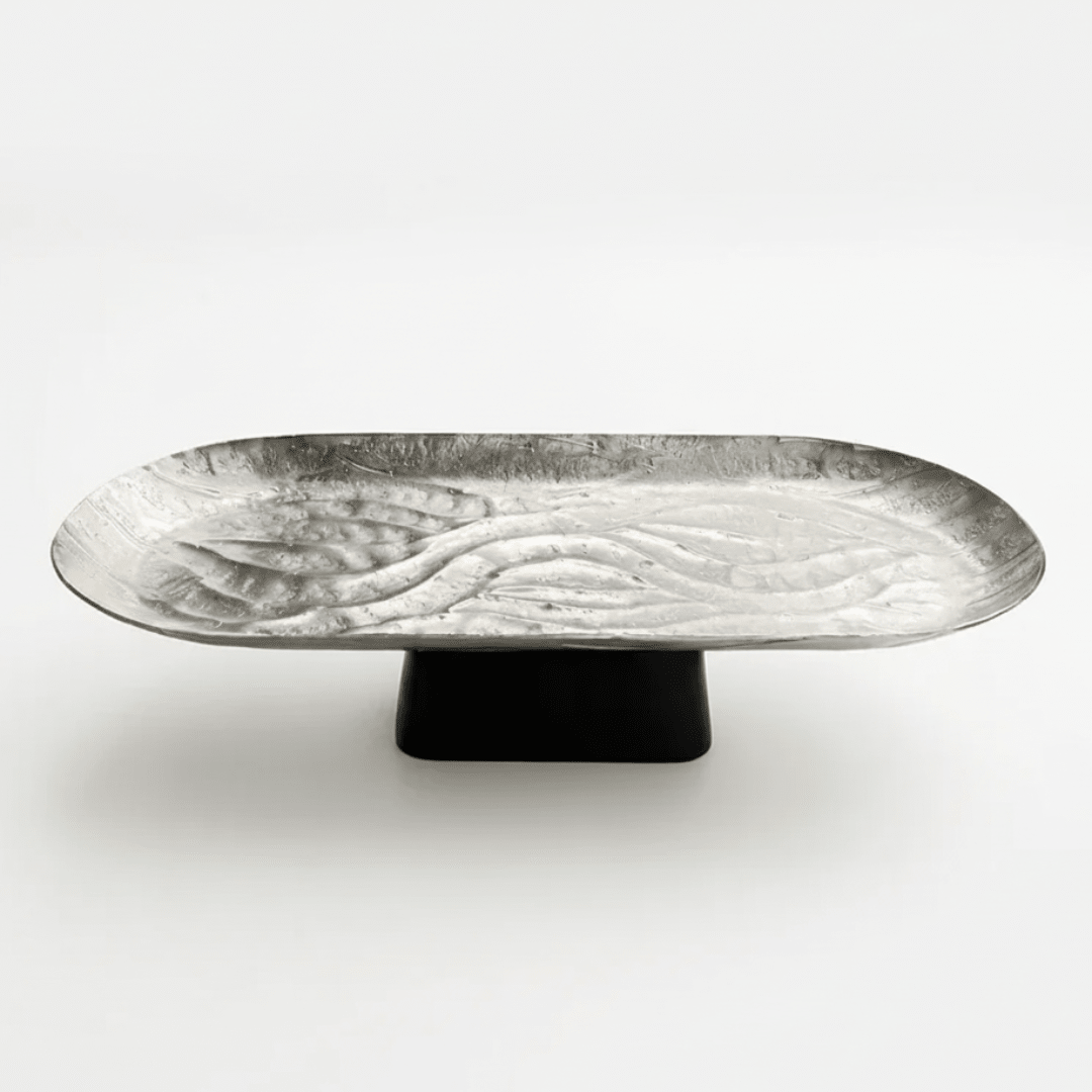 Luhpar Wave Textured Aluminium Oval Pedestal Dish With Black Wooden Base – 40×18×10 cm - 74894-A - Al Kabayel Discount CentreLuhpar Wave Textured Aluminium Oval Pedestal Dish With Black Wooden Base – 40×18×10 cm - 74894-AServing TraysLUHPARAl Kabayel Discount Centre