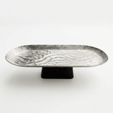 Luhpar Wave Textured Aluminium Oval Pedestal Dish With Black Wooden Base – 40×18×10 cm - 74894-A - Al Kabayel Discount CentreLuhpar Wave Textured Aluminium Oval Pedestal Dish With Black Wooden Base – 40×18×10 cm - 74894-AServing TraysLUHPARAl Kabayel Discount Centre