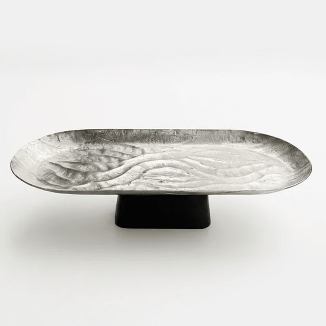 Luhpar Wave Textured Aluminium Oval Pedestal Dish with Black Wooden Base - 50×18×13cm - 74894-B - Al Kabayel Discount CentreLuhpar Wave Textured Aluminium Oval Pedestal Dish with Black Wooden Base - 50×18×13cm - 74894-BServing TraysLUHPARAl Kabayel Discount Centre