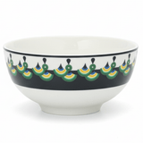 "White ceramic bowl with traditional Middle Eastern geometric pattern in green, yellow and black - premium tableware"