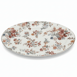 Alt text: "Elegant oval serving platter with vintage floral pattern in burgundy, coral, and sage green with gold rim on white background"


