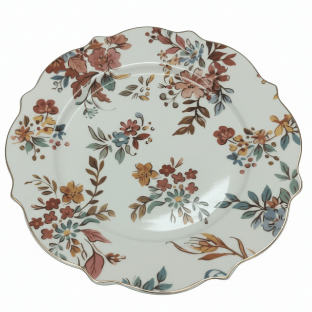 "Hand-painted floral ceramic plate with scalloped gold rim featuring rust, coral, and sage botanical pattern on cream base"